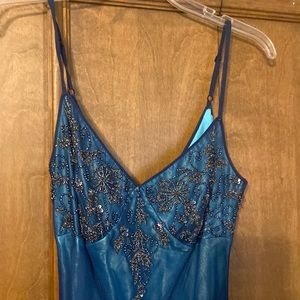 teal blue slip dress with navy beaded overlay